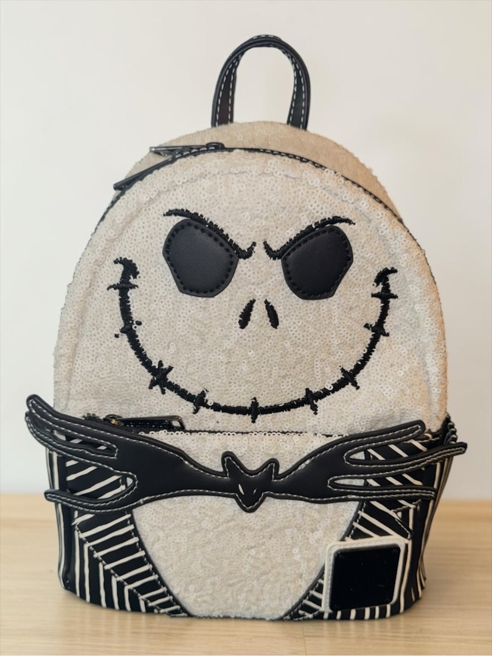 Loungefly NBC Sequin Jack Skellington Mini Backpack in White & Black
